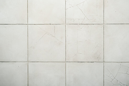 Old cracked tile. Grey old marble texture for background or tiles floor decorative design. Cement concrete painted texture. Background, texture.