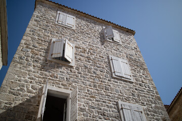 Fototapeta na wymiar typical apartment building in Petrovac in Montenegro