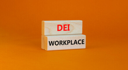 DEI diversity equity inclusion workplace symbol. Blocks with words DEI workplace on beautiful orange background. Business DEI diversity equity inclusion workplace concept. Copy space.