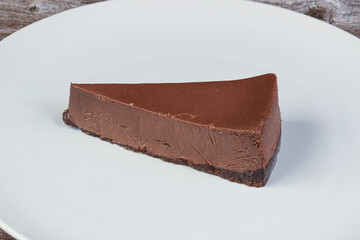 Chocolate cheesecake in the plate