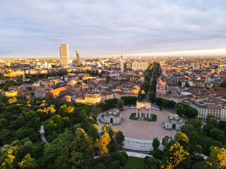 Aerial view of Arco della Pace in Milano, north Italy. Drone photography of Arch of Peace in Piazza Sempione, near Sempione park in the heart of Milan, Lombardy and Sforza Castle.