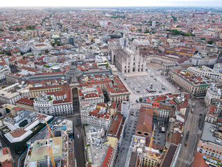 Obraz premium Aerial view of Castello Sforzesco (Sforza castle) in Milan. Drone photography in Lombardia. Historic medieval Sforza fortress and Arco della Pace in Sempione park, north Italy, in Europe.