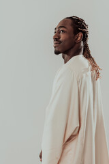 Portrait of handsome african black man in traditional islamin sudan fashion clothes. Selective...