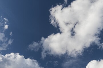 Obraz premium The clouds, contrast and beautiful scenery, beautiful weather and life. Warm and dynamic scenery.