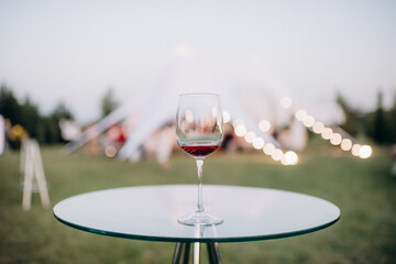 glasses with unfinished alcoholic drink at a party