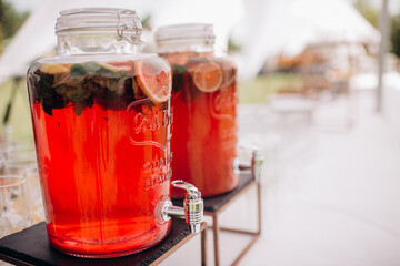 catering, large bottles of lemonade at a wedding party