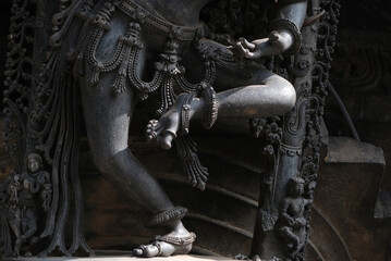 Stone Sculpture of Beautiful Female (Madanikas) with selective focus, 12th century Hindu temple,...