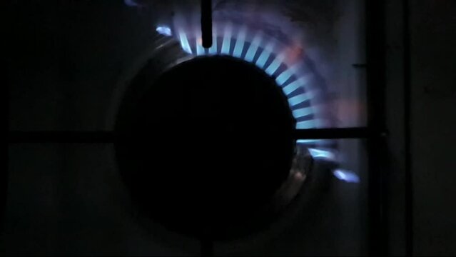 Slow motion of a gas stove getting light up