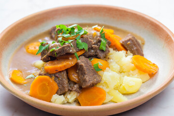 beef stew with carrot and mashed potatoes