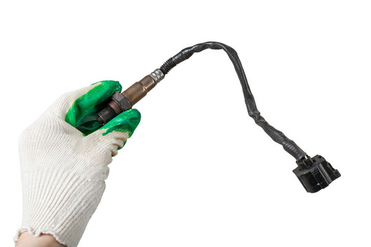 Lambda probe - oxygen sensor device designed to record amount of remaining oxygen in the exhaust gas of car engine is located in exhaust system. Metal spare part for replacement to repair in workshop.