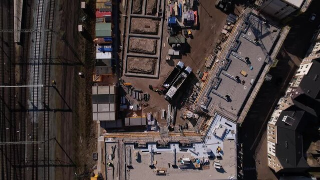 Top down aerial of construction site in Zutphen of real estate investment and social housing market collective building Ubuntuplein project. Dutch engineering and  contemporary apartment architecture