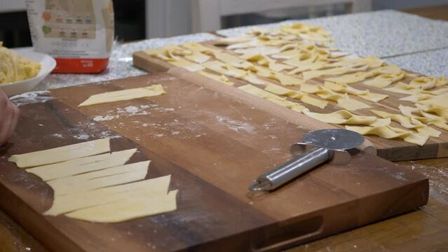 Shaping faworki polish wings dough for fat thursday Tlusty Czwartek