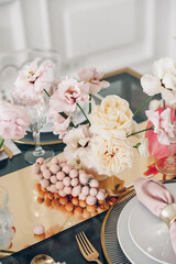 Wedding table setting with flowers and polygraphy. luxury living room. 
