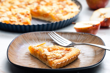 still life of fruit cake with almonds