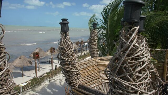 high view of holbox beach and palm trees