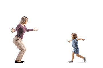 Full length profile shot of a child running towards mother