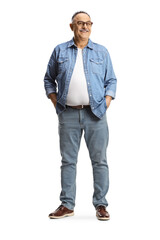 Full length portrait of a smiling casual mature man wearing a denim shirt and jeans