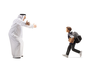 Full length profile shot of an arab man waiting to hug a schoolboy