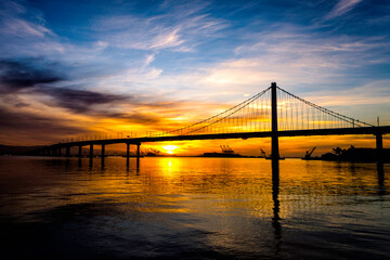 Fototapeta na wymiar Sunrise at Bay Bridge, San Fransisco, California