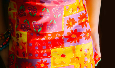 Bright clothes fragment close up. Festive dress. 