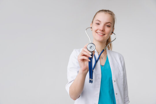 Closeup shot of stethoscope in female doctor hand ready to listen breath.