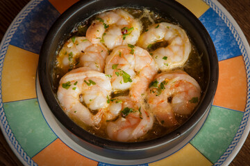 Bowl of garlic prawns