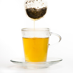 Cupof green tea with tea bag