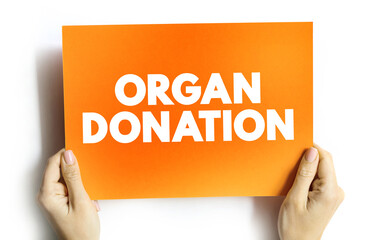 Organ donation text quote on card, medical concept background