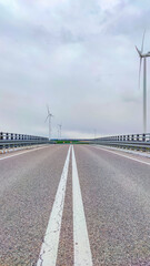 Electric wind turbine generating with blue sky and turbo generator
