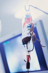 Save a life, donate blood. Low angle shot of blood in an iv drip at a hospital.