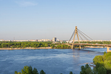 Summer landscape of the city of Kiev with a view of the Moscow bridge and the Dnieper River