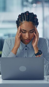 Vertial Video. Young Black Woman Office Worker Uses Laptop, Feels Sudden Burst of Pain, Headache, Migraine. Overworked Accountant Feeling Project Pressure, Stress, Massages Her Head, Temples