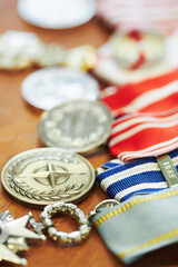Naklejka premium To honor and serve. Closeup shot of war medals lying on a table.