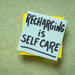 recharging is self care inspirational reminder note, healthy lifestyle and personal development concept