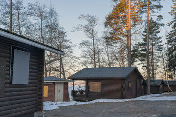 Finland Venesilta. April 3, 2022. Camping for tourists. Wooden houses. Winter landscape.