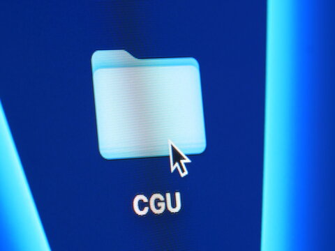 CGU - Conditions g&eacute;n&eacute;rales d'utilisation - photo macro d'un dossier sur un &eacute;cran d'ordinateur