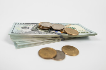 stack of american dollars and cents.