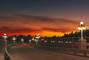 The Colorado Street Bridge in Pasadena, California at twilight. The bridge has been designated a...