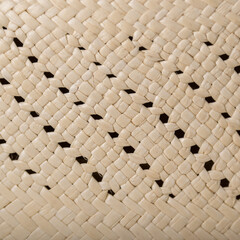 Fragment of dense fabric made of yellow synthetic thread