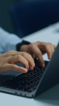 Vertical Clip: Close Up of African American Businesswoman Working on Laptop Computer in Office Late in the Evening. Female Executive Director Managing Digital e-Commerce Project, Finance Analysis.