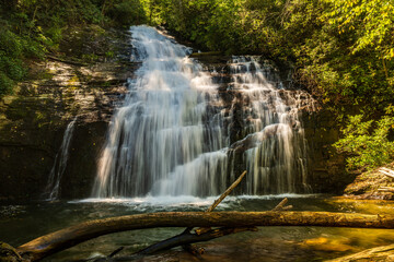 Fototapeta na wymiar Water flows down Helton Creek Water Falls in Georgia