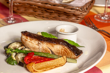 fried cod with asparagus and vegetables