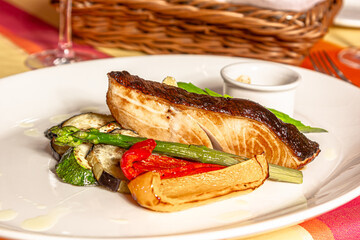 fried cod with asparagus and vegetables