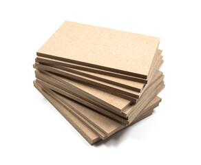 Boards of raw mediapan on a white background. All the boards were cut to the same dimensions in order to print photos on them.