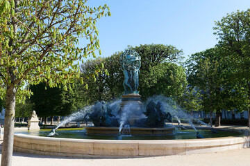 A beautiful fountain called Observatory fountain in the southern part of Luxembourg Gardens. Fountain was erected in 1874. Paris.