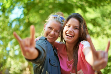 Having fun with my best friend. Two young female friends having fun at an outdoor event.