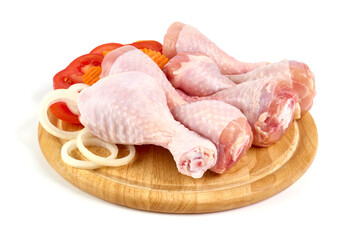 Raw chicken legs, isolated on white background.