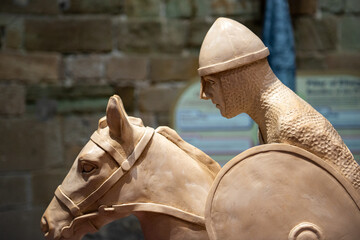 Close-up shot of the Norman knight statue during the day