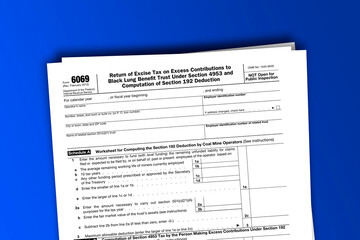 Obraz premium Form 6069 documentation published IRS USA 07.17.2012. American tax document on colored