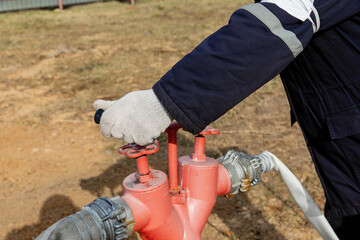 Fire hydrant column for fire extinguishing water supply. Connecting the hydrant.